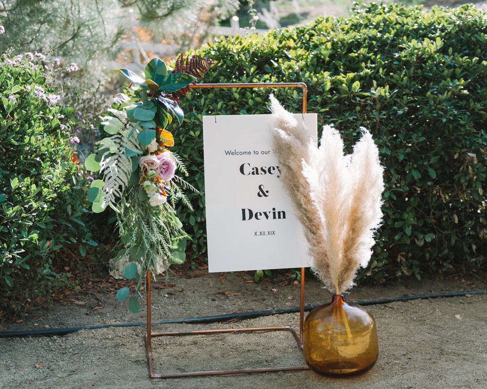 Sign Banner Flowers Pampas Grass Socal Wedding Mark Mirocha Photography