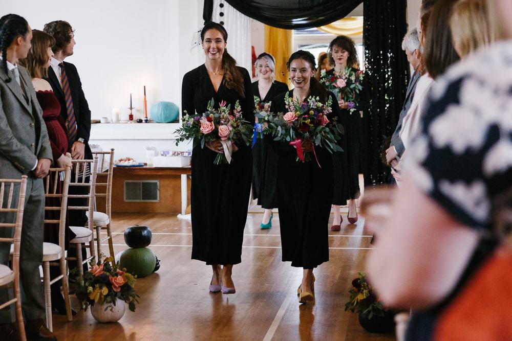 Bridesmaids Bridesmaid Black Jumpsuits Village Hall Wedding Emily + Katy Photography