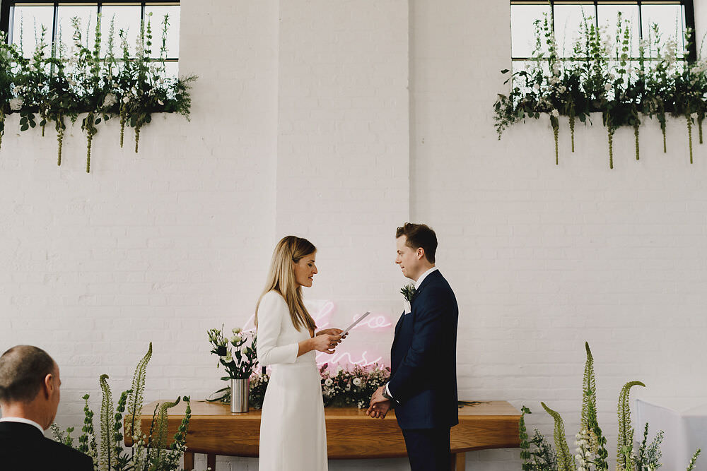 Ceremony Backdrop Greenery Foliage Neon Sign Winding House Wedding MIKI Studios