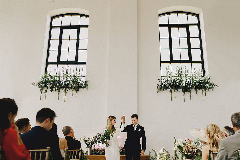 Ceremony Backdrop Greenery Foliage Neon Sign Winding House Wedding MIKI Studios