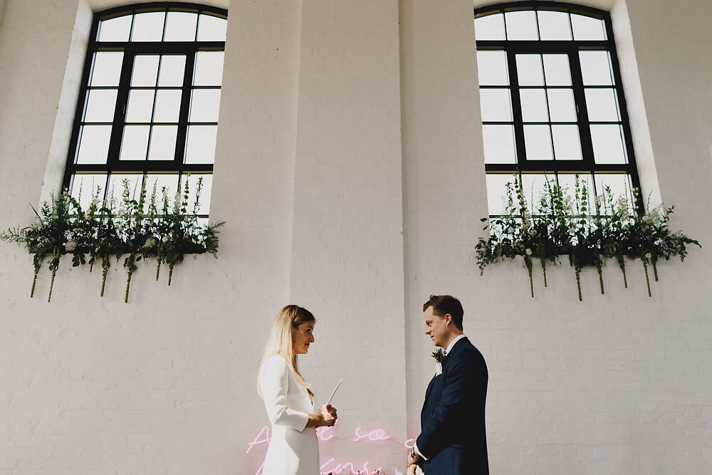 Ceremony Backdrop Greenery Foliage Neon Sign Winding House Wedding MIKI Studios