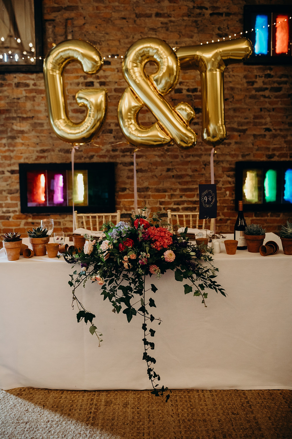 Top Table Flowers Giant Balloons Hornington Manor Wedding Richard Skins Photography