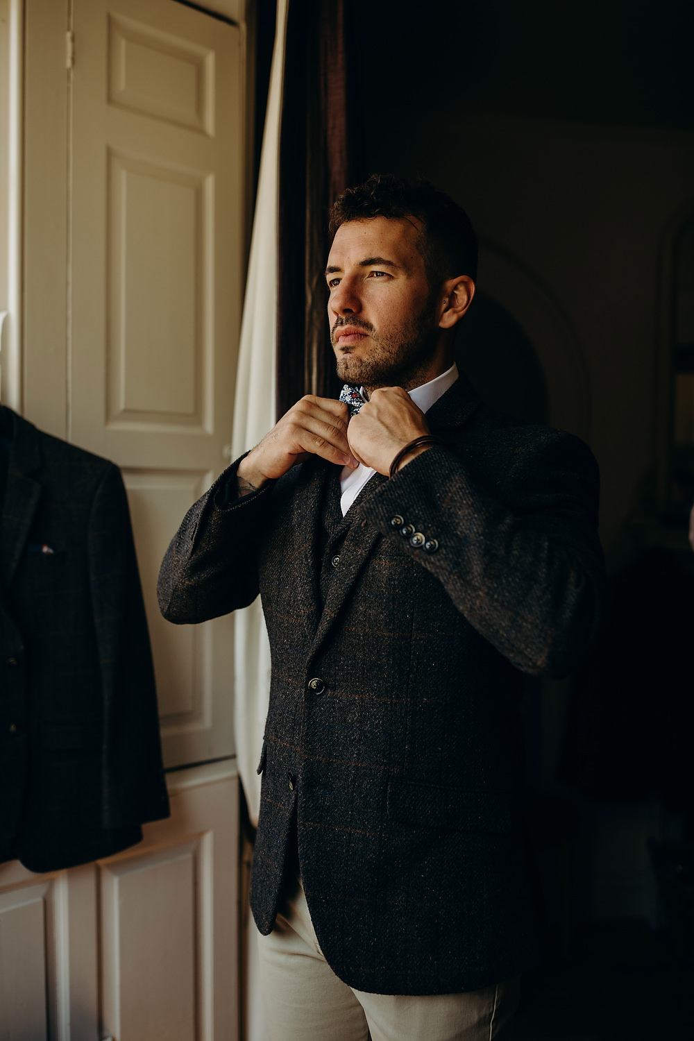 Groom Suit Tweed Jacket Waistcoat Bow Tie Trousers Hornington Manor Wedding Richard Skins Photography
