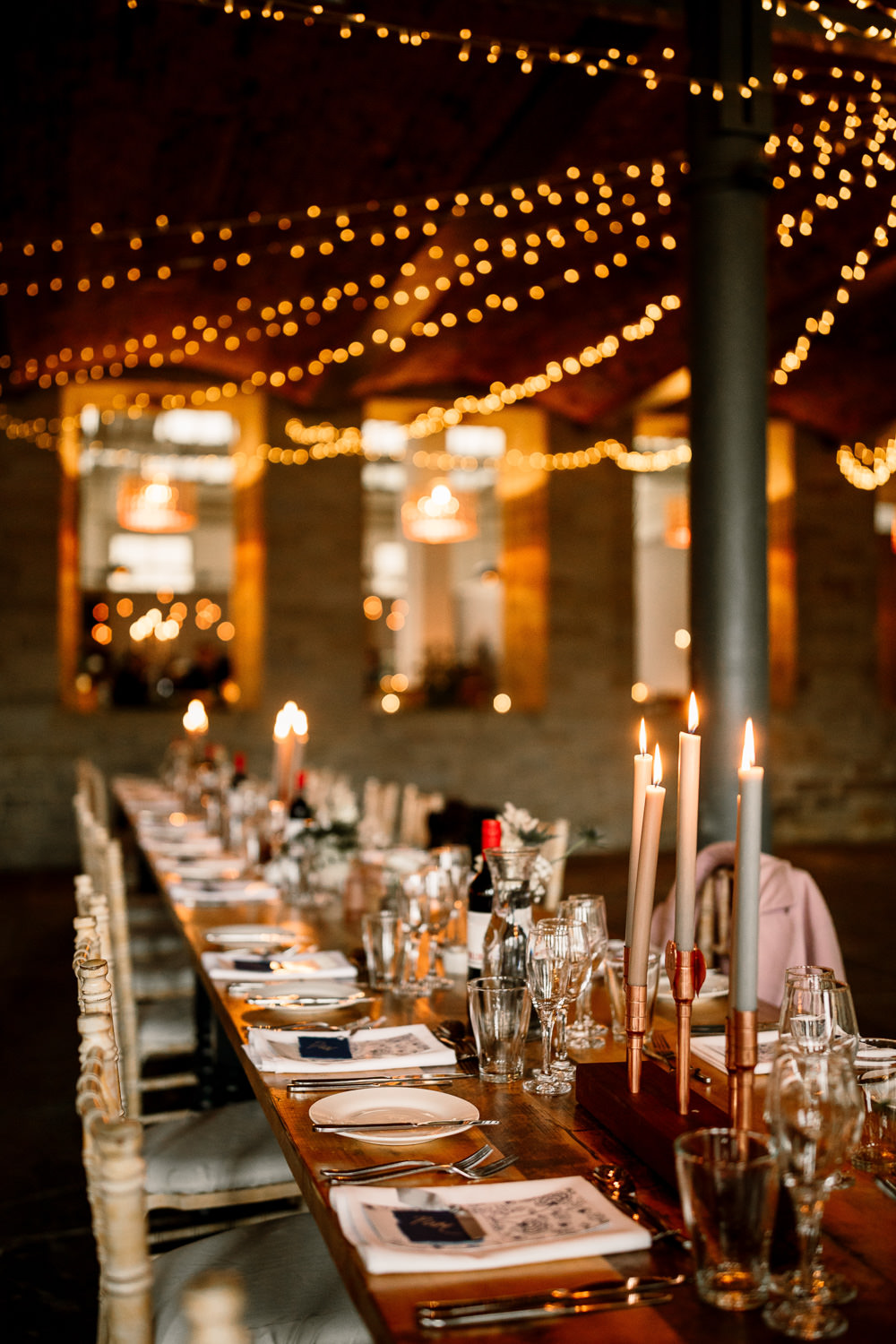 Arches in Halifax Warehouse Fairy Lights Long Tables Decor Industrial Mill Wedding Hayley Baxter Photography
