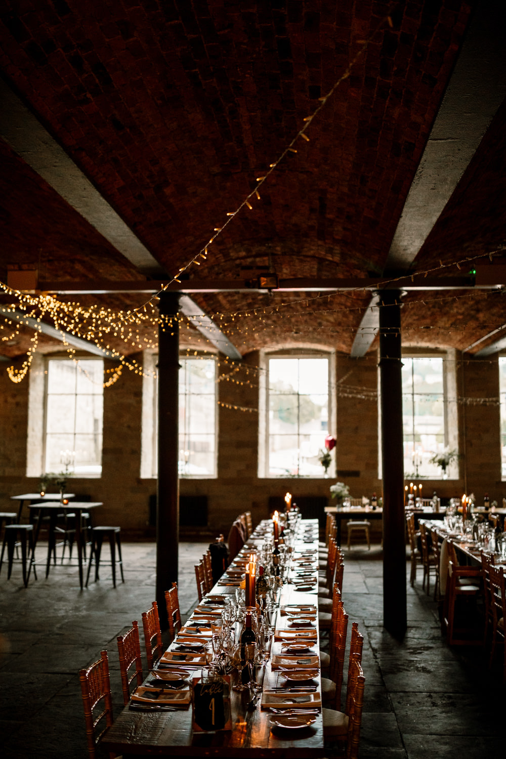 Arches in Halifax Warehouse Fairy Lights Long Tables Decor Industrial Mill Wedding Hayley Baxter Photography