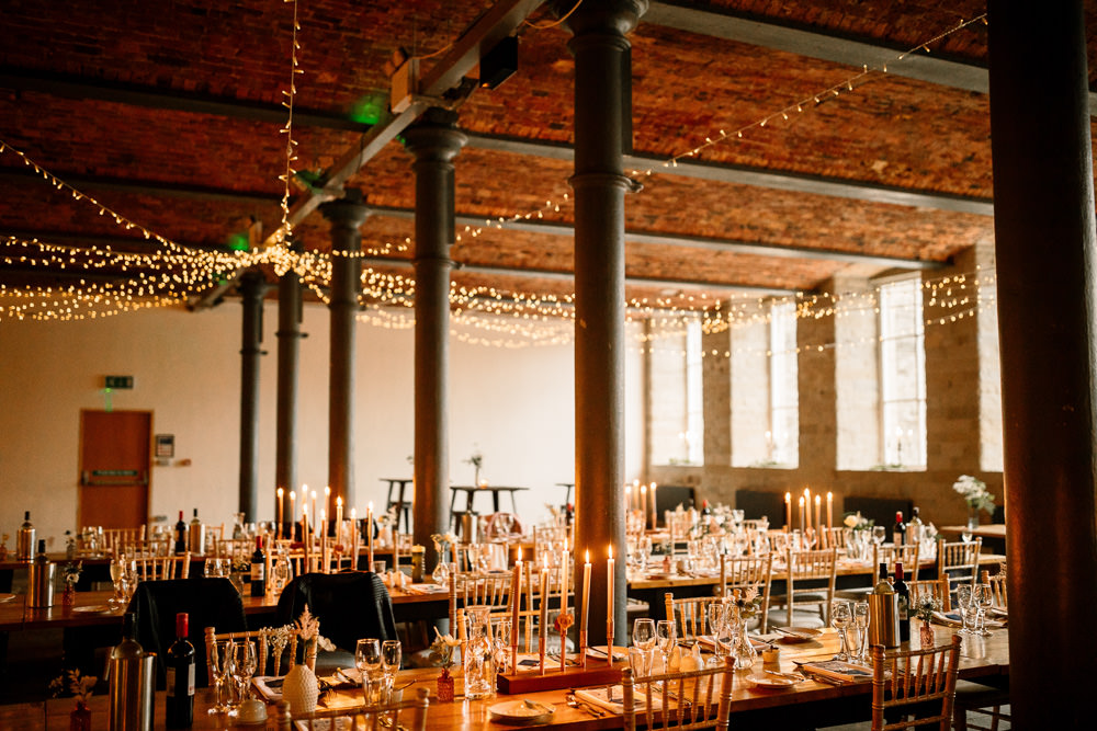 Arches in Halifax Warehouse Fairy Lights Long Tables Decor Industrial Mill Wedding Hayley Baxter Photography