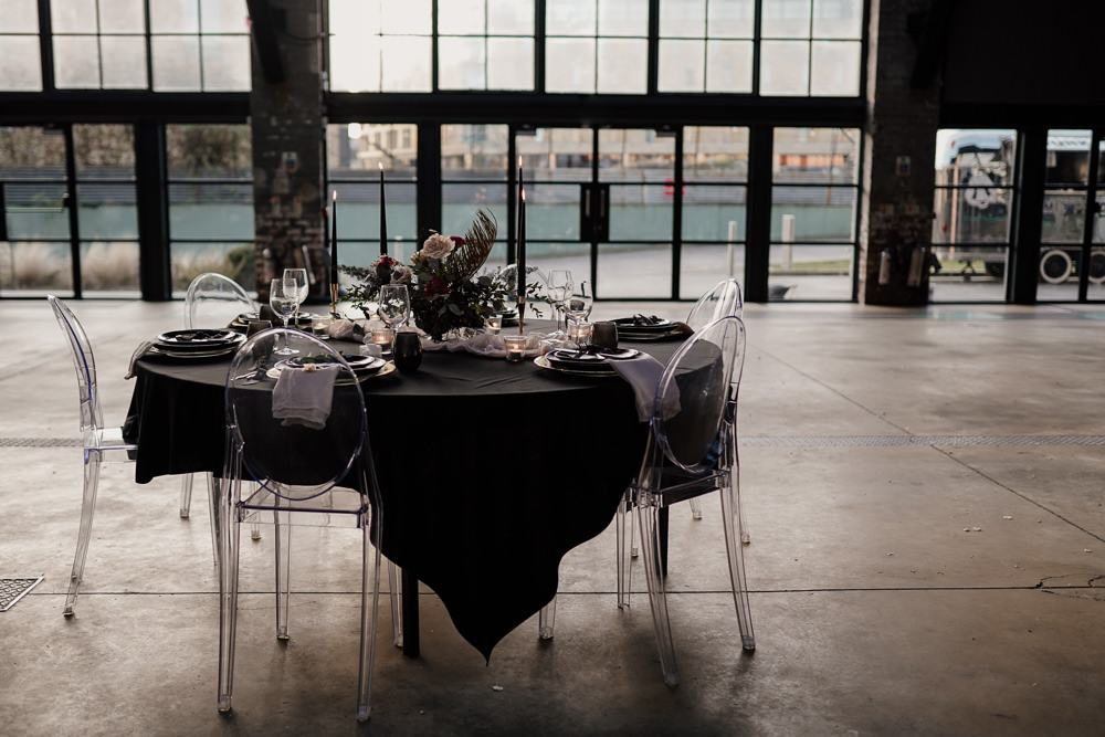 Table Tablescape Decor Black Table Cloth Candles Flowers Ghost Chairs Industrial Wedding Ideas Sam Sparks Photography