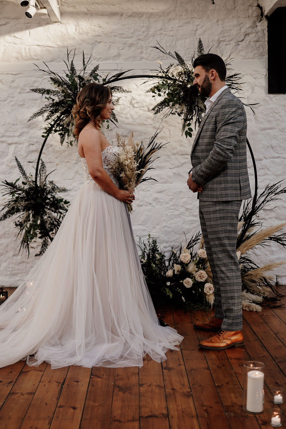 Moongate Flower Arch Candles Aisle Ceremony Pampas Grass Industrial Wedding Ideas Sam Sparks Photography