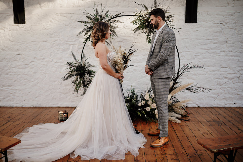 Moongate Flower Arch Candles Aisle Ceremony Pampas Grass Industrial Wedding Ideas Sam Sparks Photography