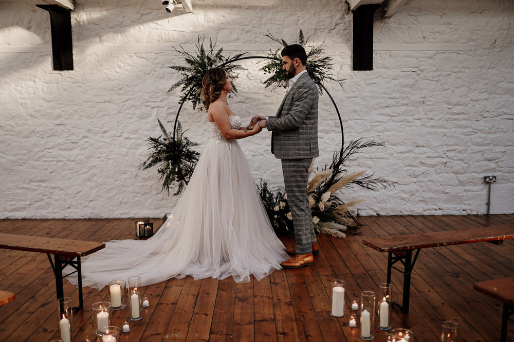 Moongate Flower Arch Candles Aisle Ceremony Pampas Grass Industrial Wedding Ideas Sam Sparks Photography
