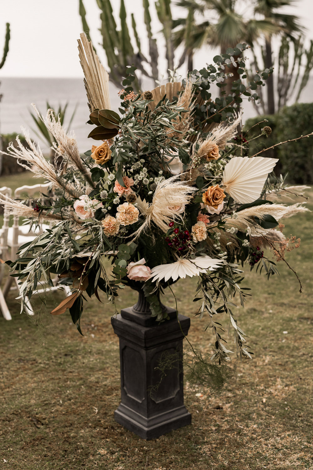 Flowers Dried Palm Leaves Greenery Foliage Orange Rose Pampas Grass Marbella Elopement Wedding Nora Photography