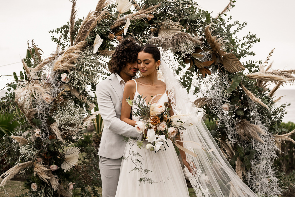 Flowers Dried Palm Leaves Greenery Foliage Orange Rose Pampas Grass Flower Arch Marbella Elopement Wedding Nora Photography