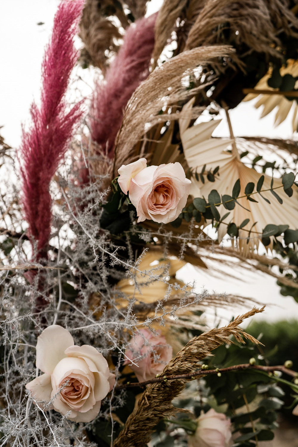 Flowers Dried Palm Leaves Greenery Foliage Orange Rose Pampas Grass Flower Arch Marbella Elopement Wedding Nora Photography