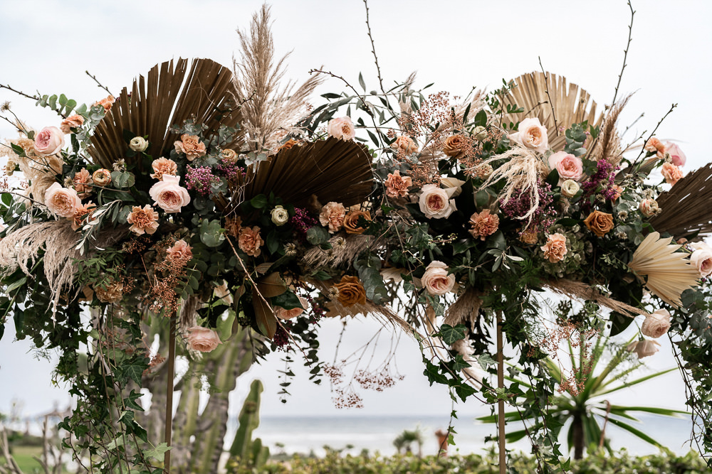 Flowers Dried Palm Leaves Greenery Foliage Orange Rose Pampas Grass Flower Arch Marbella Elopement Wedding Nora Photography