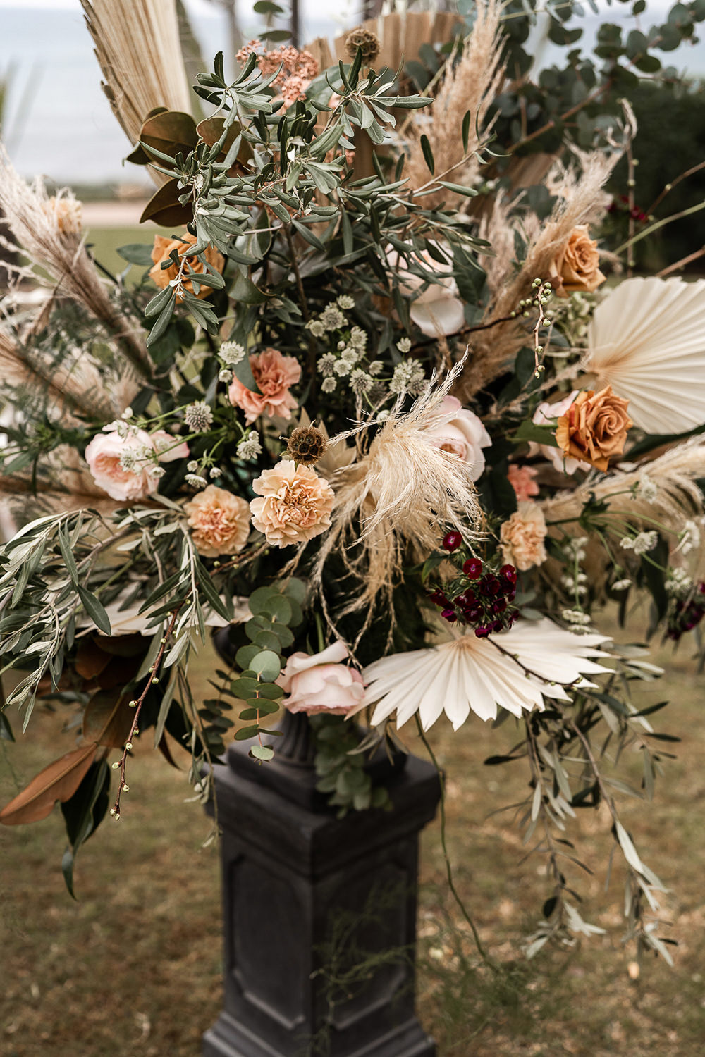 Flowers Dried Palm Leaves Greenery Foliage Orange Rose Pampas Grass Marbella Elopement Wedding Nora Photography
