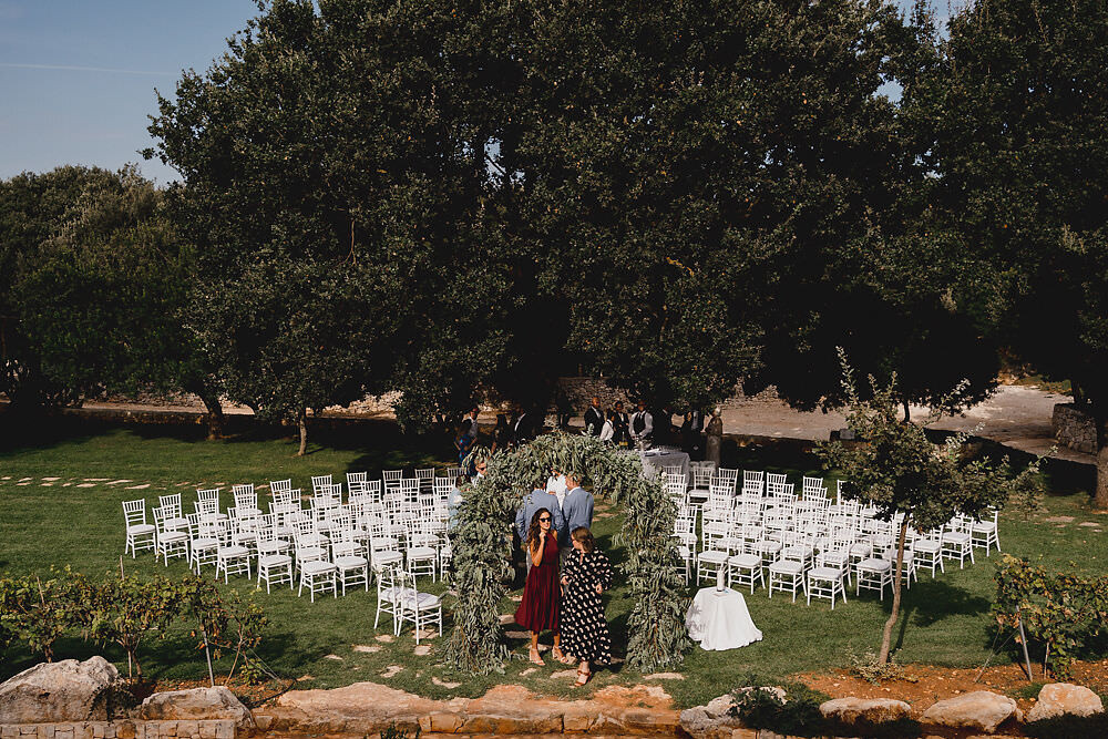 Outdoor Ceremony Flower Arch Greenery Foliage Backdrop Puglia Wedding MIKI Studios