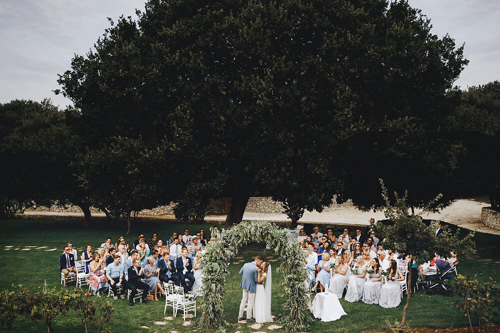 Outdoor Ceremony Flower Arch Greenery Foliage Backdrop Puglia Wedding MIKI Studios
