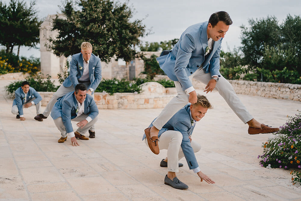 Groom Groomsmen Suits Blue Jacket Cream Trousers Tan Shoes Puglia Wedding MIKI Studios