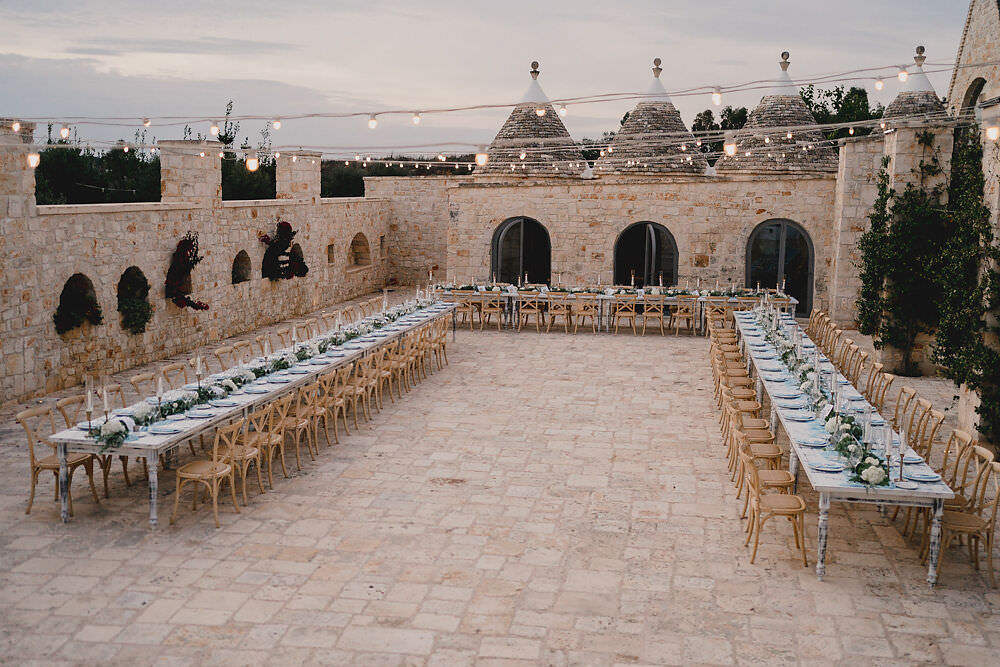 Outdoor Reception Festoon Lights U Table Greenery Foliage Candles Decor Puglia Wedding MIKI Studios