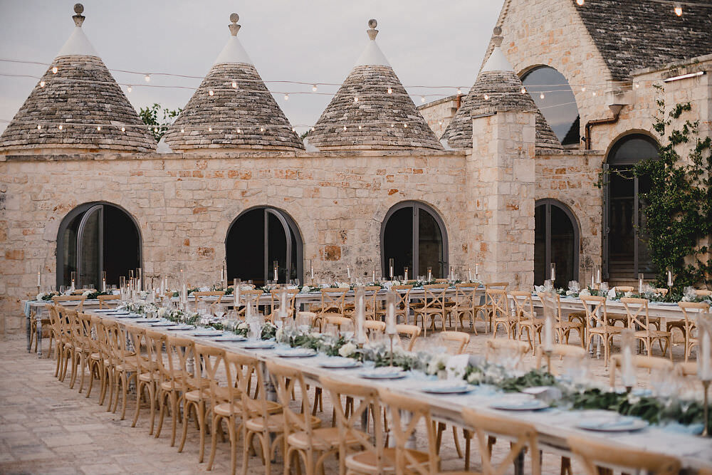 Outdoor Reception Festoon Lights U Table Greenery Foliage Candles Decor Puglia Wedding MIKI Studios