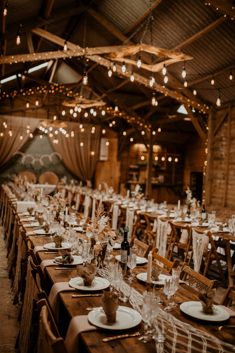 Barn Lights Lighting Flowers Long Tables Decor Whimsical Boho Wedding Camilla Andrea Photography