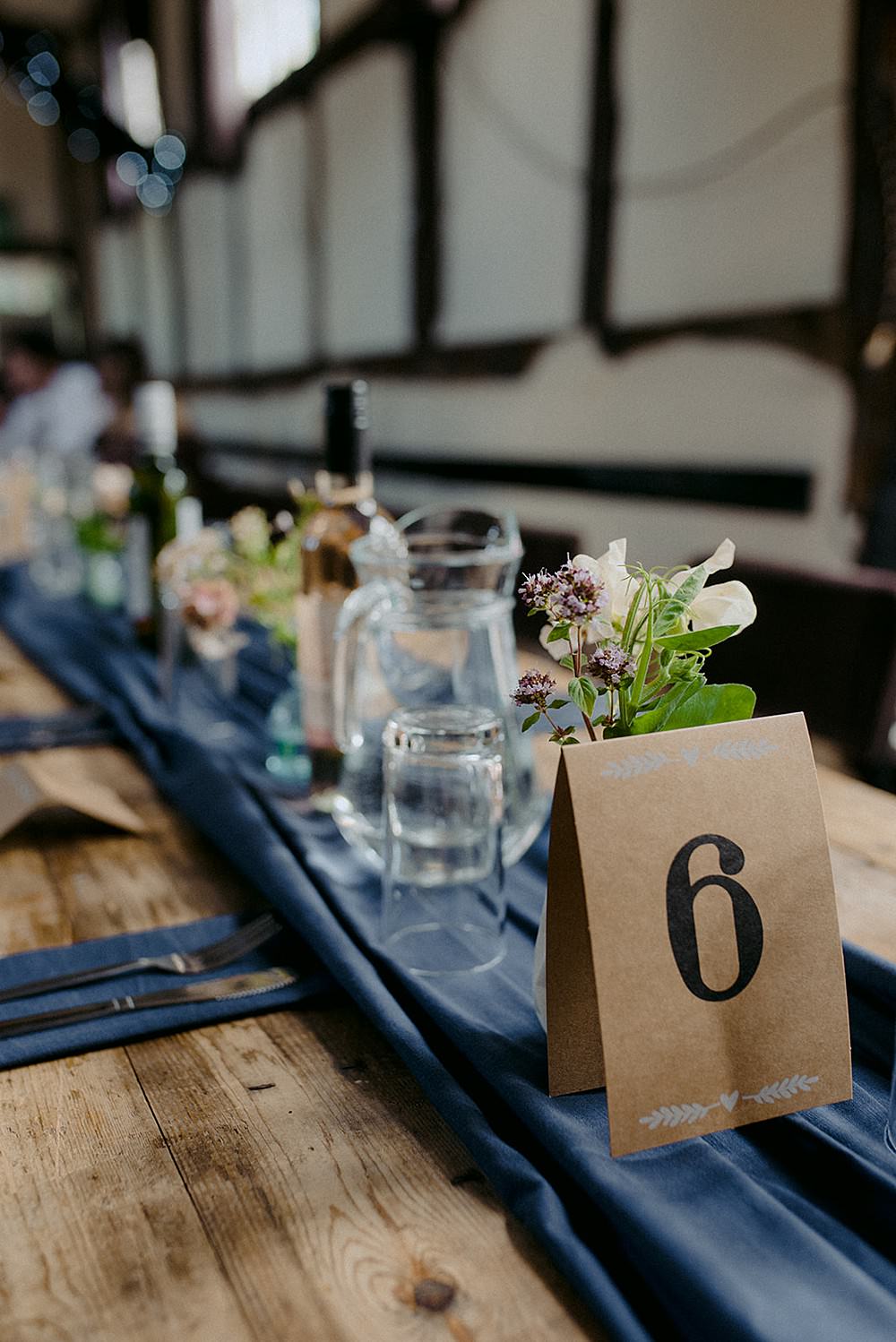 Rustic Wooden Table Runner Blue Cloth Flowers Roses Table Name Belbroughton Church Hall Wedding Faye Green Photo