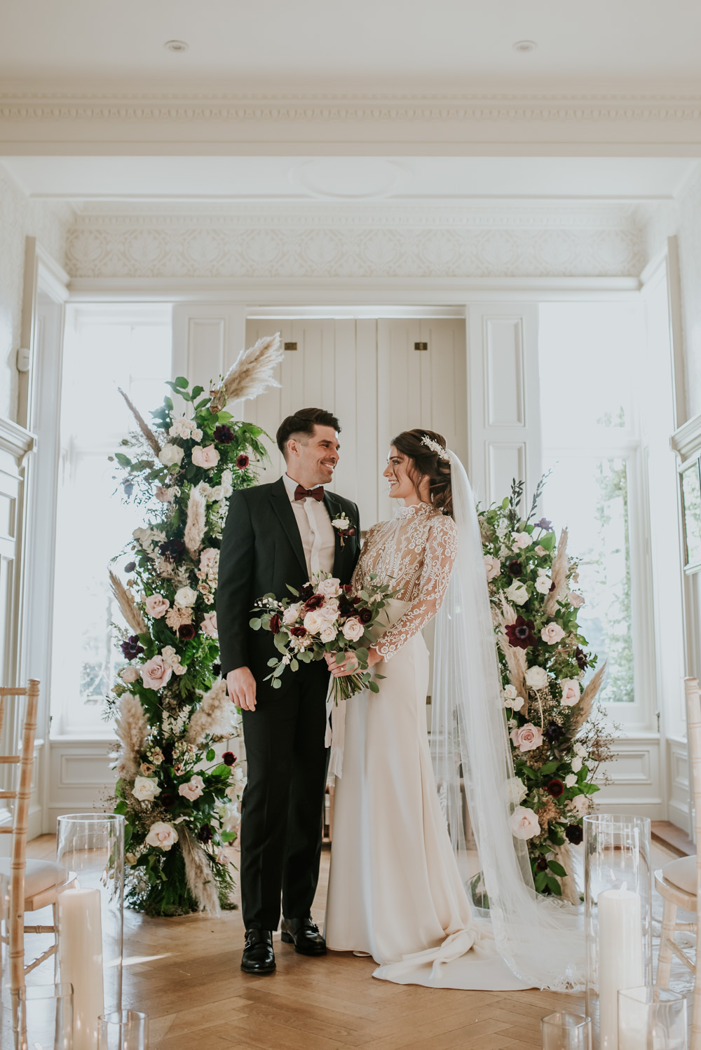 Chippenham Park Wedding Daniel Ackerley Photography Flower Arch Backdrop Ceremony