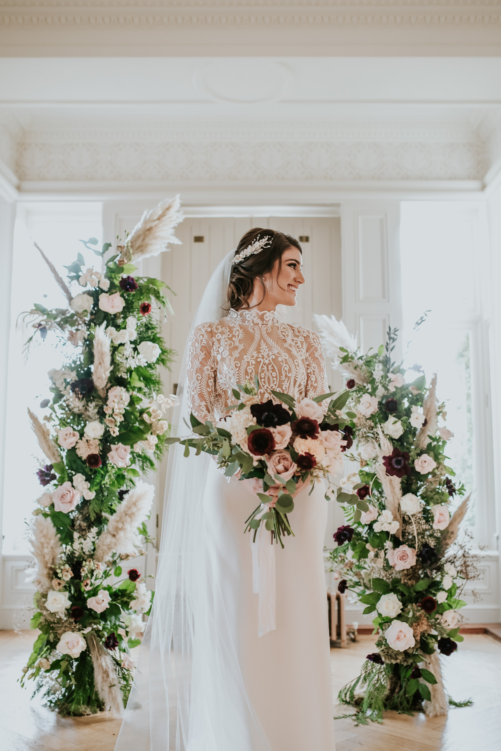 Dress Gown Bride Bridal Lace Sleeves Top Veil Lara B Bridal Chippenham Park Wedding Daniel Ackerley Photography Flower Arch Backdrop Ceremony