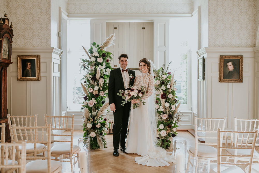 Chippenham Park Wedding Daniel Ackerley Photography Pillar Candles Aisle Decor Ceremony Flower Arch Instalation Backdrop