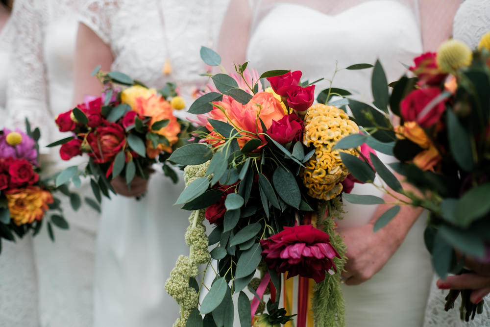 Bride Bridal Bouquet Flowers Colourful Red Orange Yellow Glenarm Castle Wedding Jonathan Ryder Photography