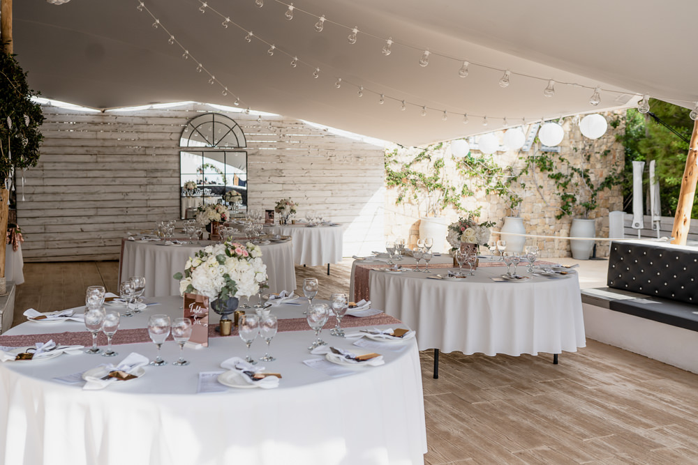 Round Tables Rose Gold Sequin Runners Pink Flowers Ibiza Destination Wedding David Christopher Photography
