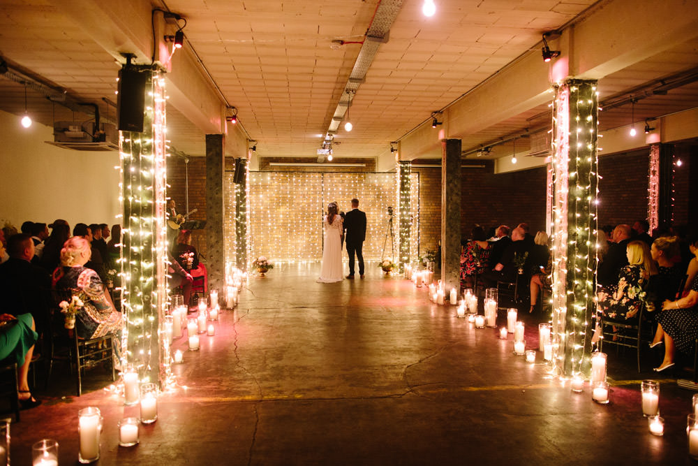 Fairy Lights Lighting Candles Ceremony Indie Warehouse Wedding Dan Hough Photo