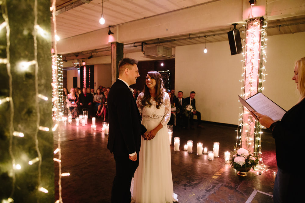 Fairy Lights Lighting Candles Ceremony Indie Warehouse Wedding Dan Hough Photo