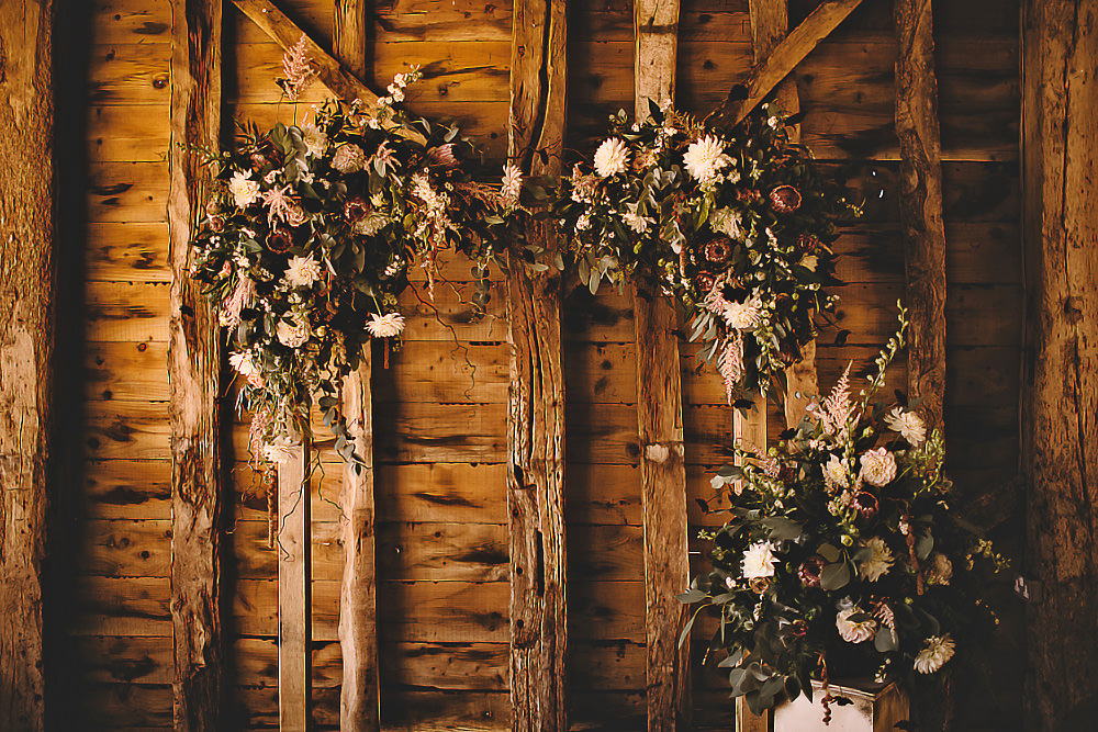 Ceremony Aisle Flower Arch Backdrop Greenery Suffolk Barn Wedding Carrie Lavers Photography