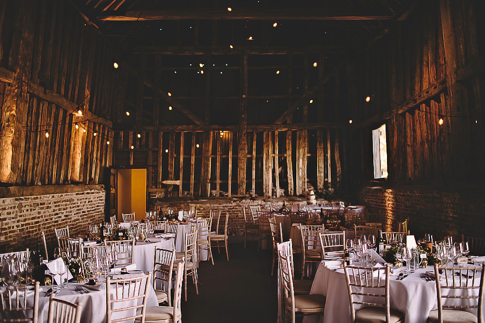 Festoon Lights Round Tables Suffolk Barn Wedding Carrie Lavers Photography