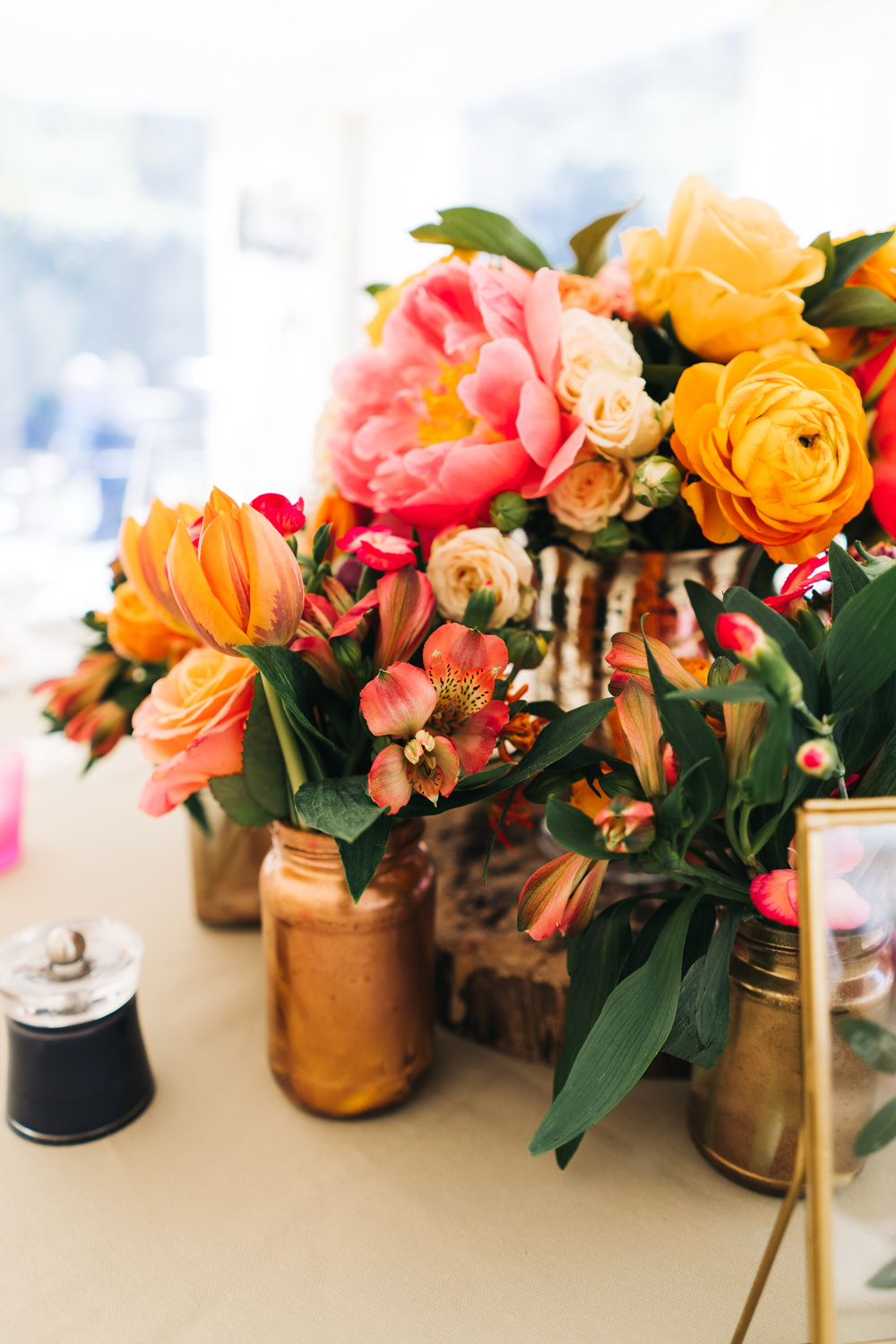 Centrepiece Flowers Bottles Peony Rose Coral Pink Orange Bright Wedding Sally T Photography