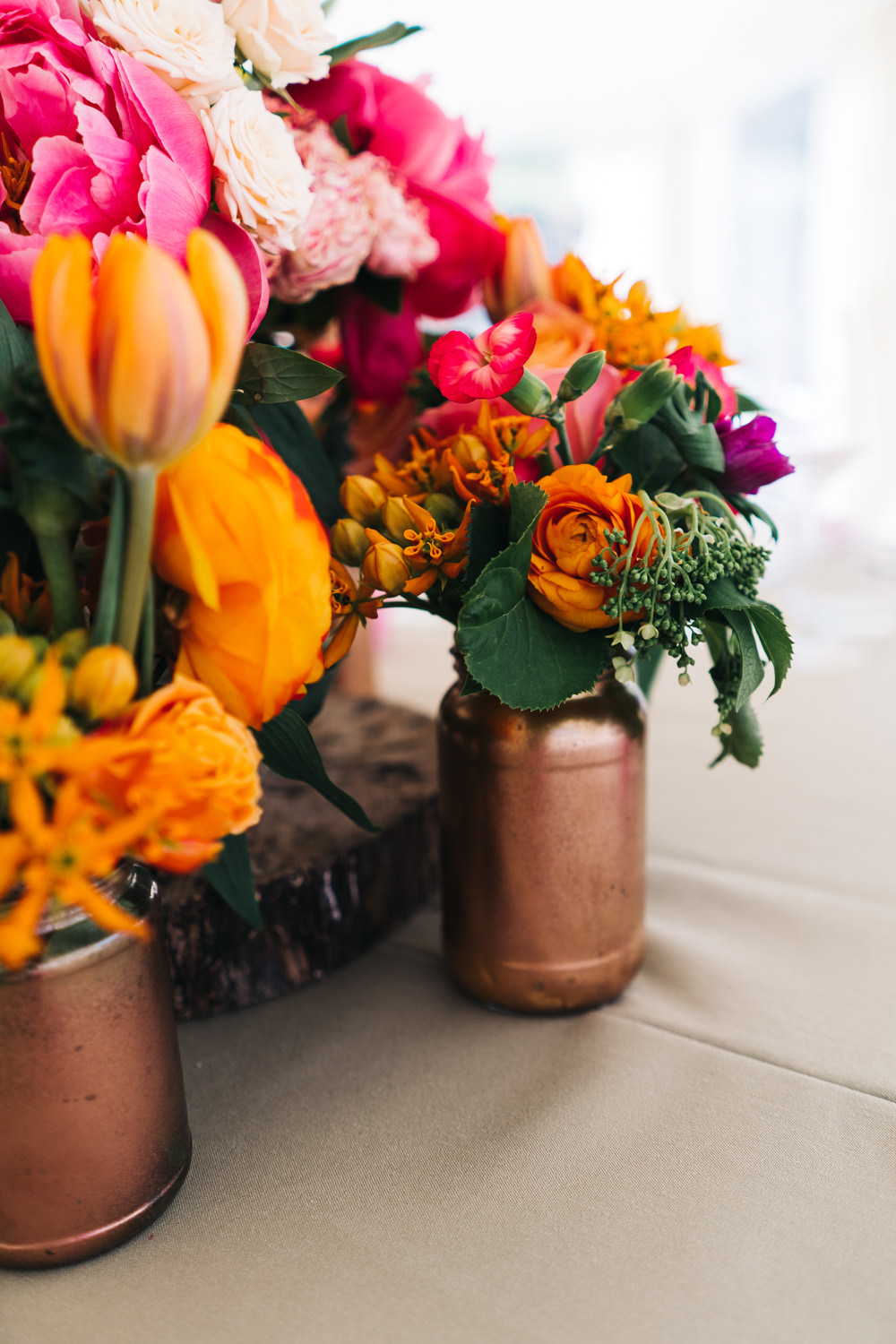 Centrepiece Flowers Bottles Peony Rose Coral Pink Orange Bright Wedding Sally T Photography