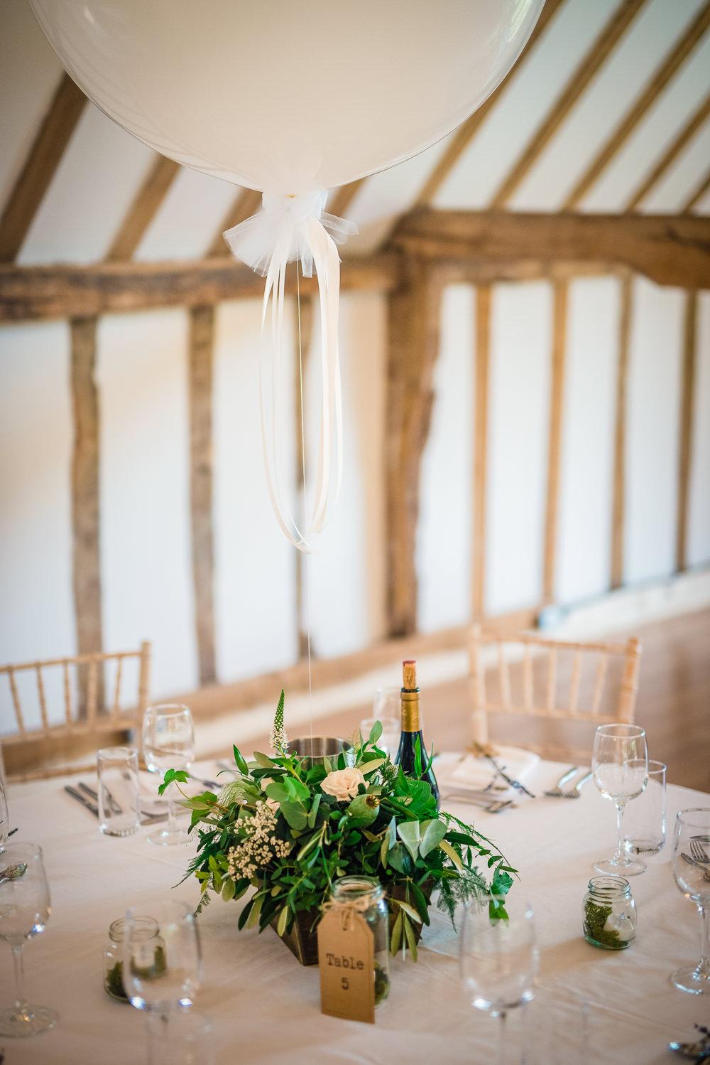 Barn Venue Reception Giant Balloons Flowers Centrepiece Colville Hall Wedding GK Photography