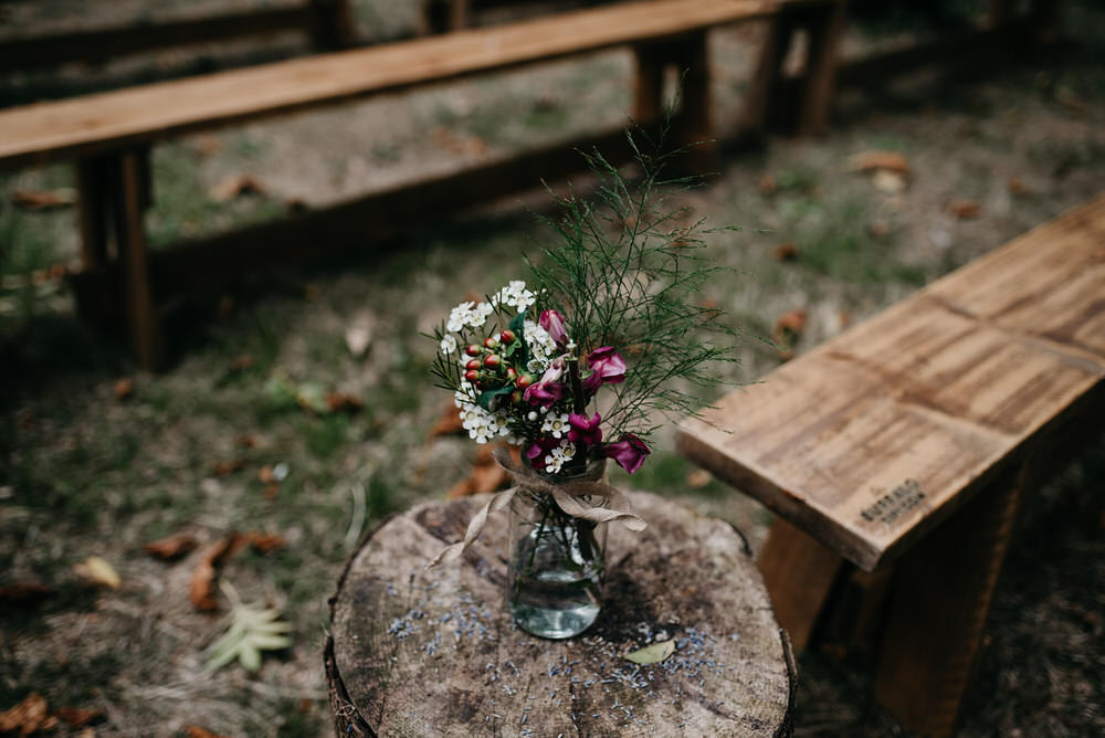 Flowers Log Stump Cotswold Woodland Glamping Wedding Elaine Williams Photography