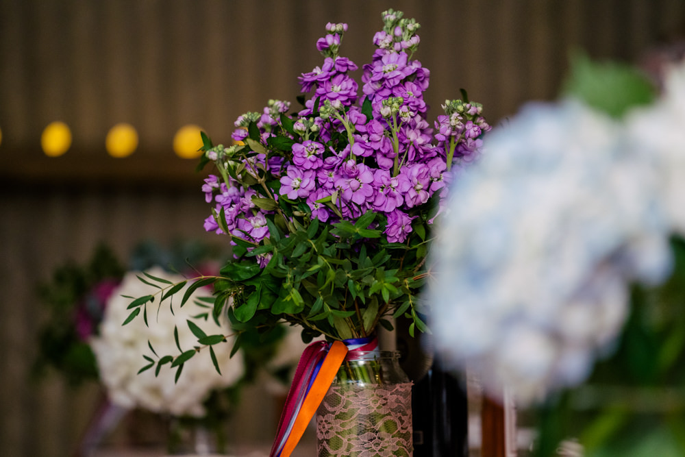Flowers in Jars Eclectic Wedding Paul and Tim Photographers