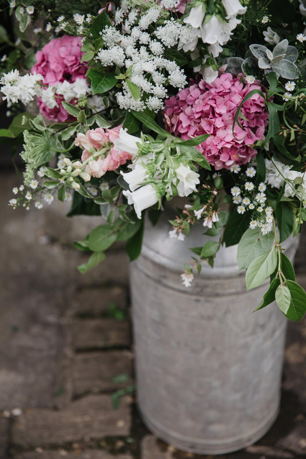 Milk Churn Flowers Field Kitchen Wedding Siobhan Amy Photography