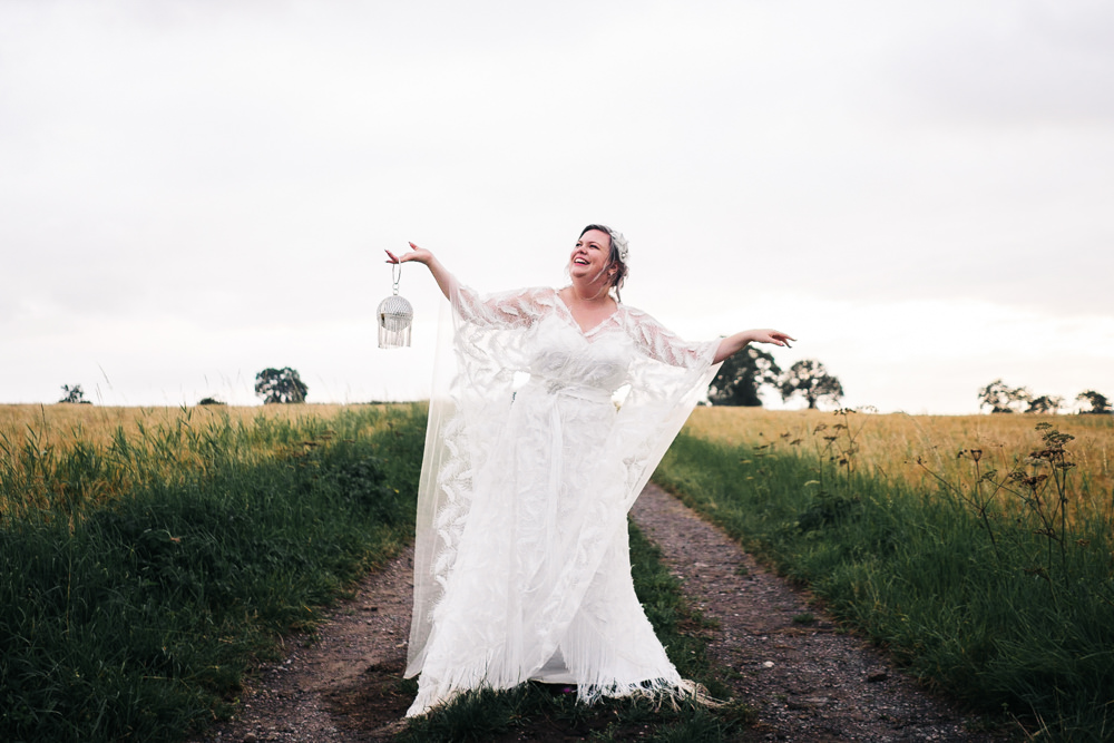 Dress Gown Bride Bridal Butterfly Sleeves Feather Hammer and Pincers Wedding Sally T Photography