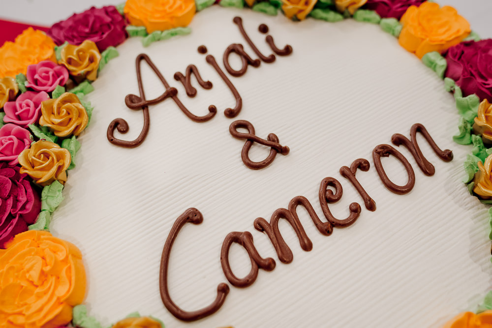 Floral Peronalised Cake Indian Wedding UK Laura May Photography