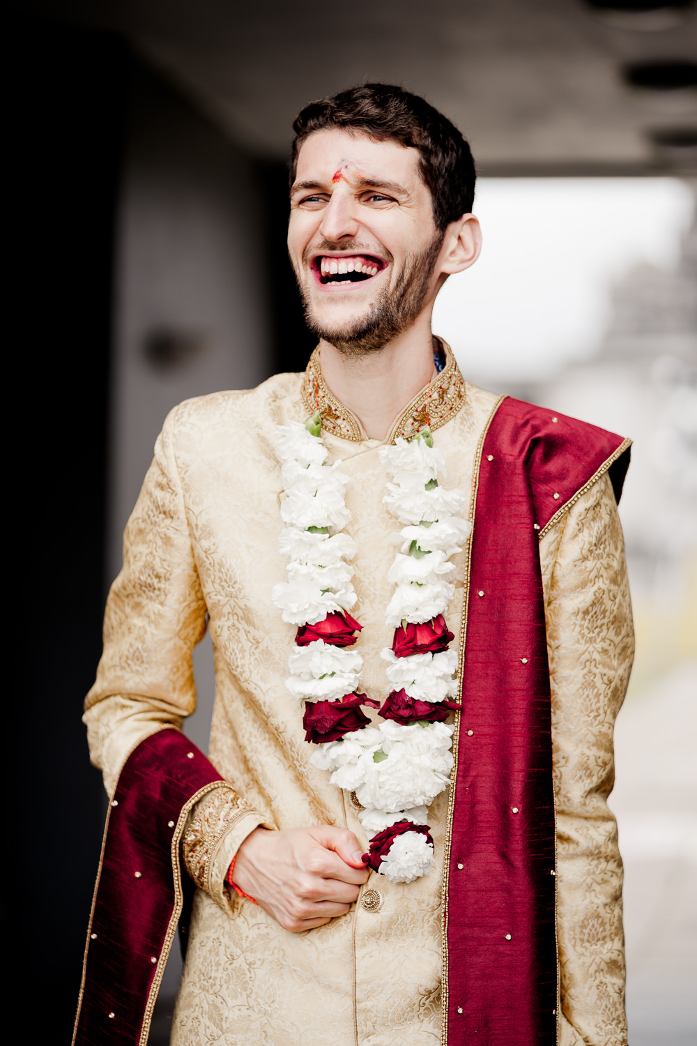 Gold Red Sherwani Groom Indian Wedding UK Laura May Photography