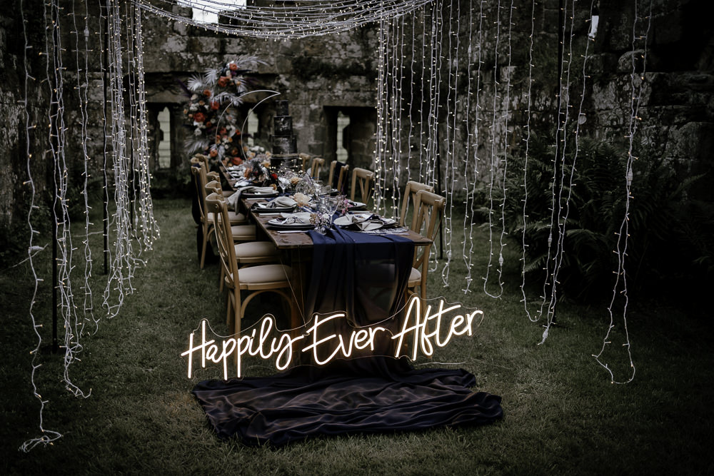 Fairy Light Tunnel Table Tablescape Decor Candles Runner Navy Neon Sign Midsummer Night's Dream Wedding Ideas Dani Louise Photography
