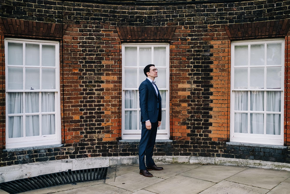 Groom Suit Navy Bow Tie Glasses Royal Hospital Chelsea Wedding Kristian Leven Photography