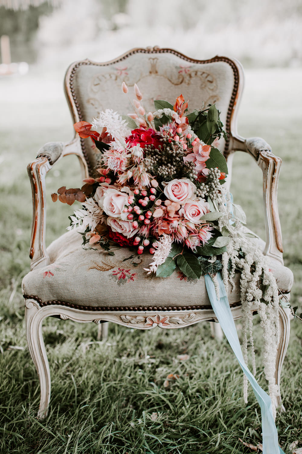 Bouquet Flowers Bride Bridal Red Pink Rose Ribbons Hydrangea Berries Whimsical Wedding Ideas Charlotte Lucy Photography