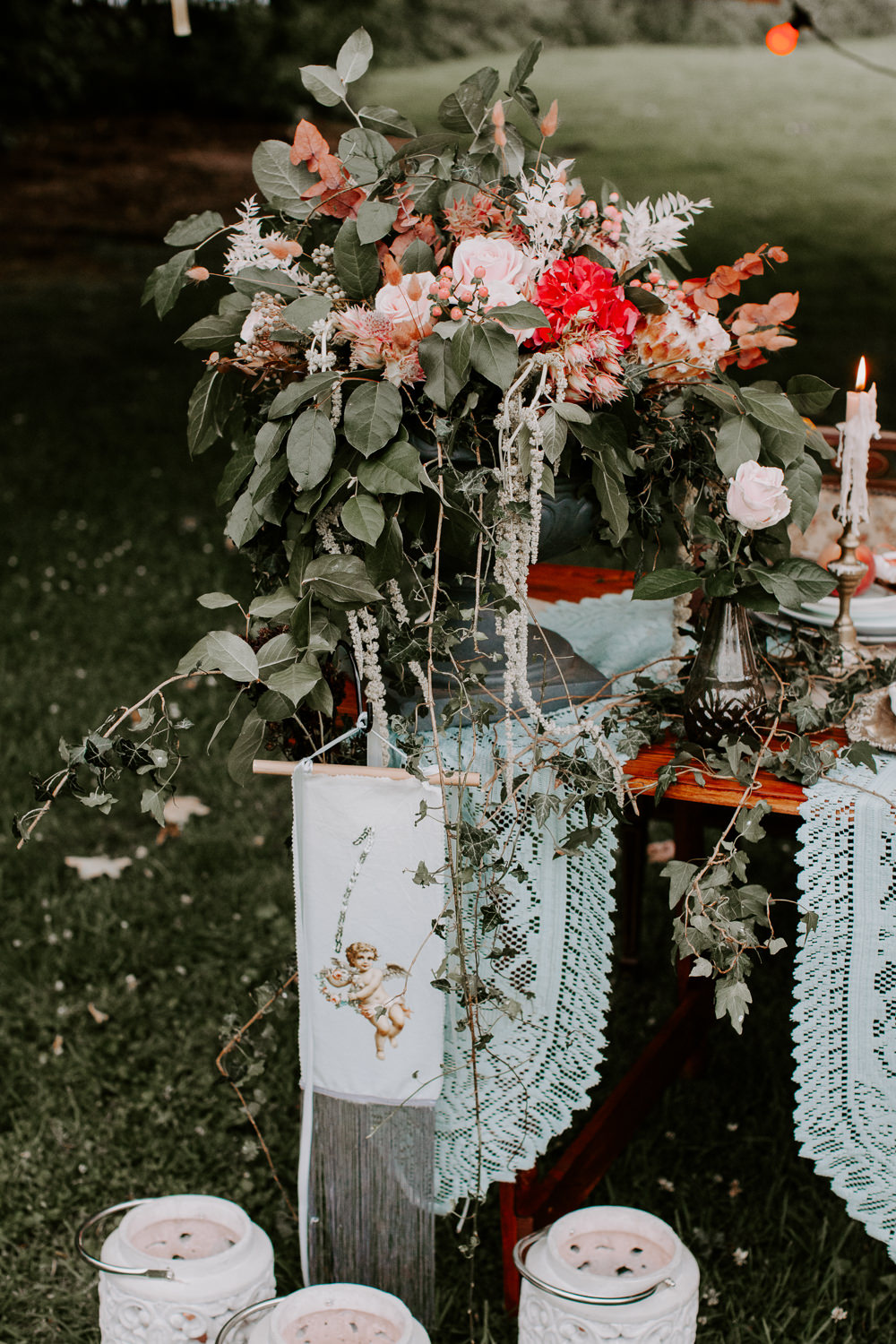 Table Flowers Centrepiece Greenery Red Pink Rose Hydrangea Berries Ivy Whimsical Wedding Ideas Charlotte Lucy Photography