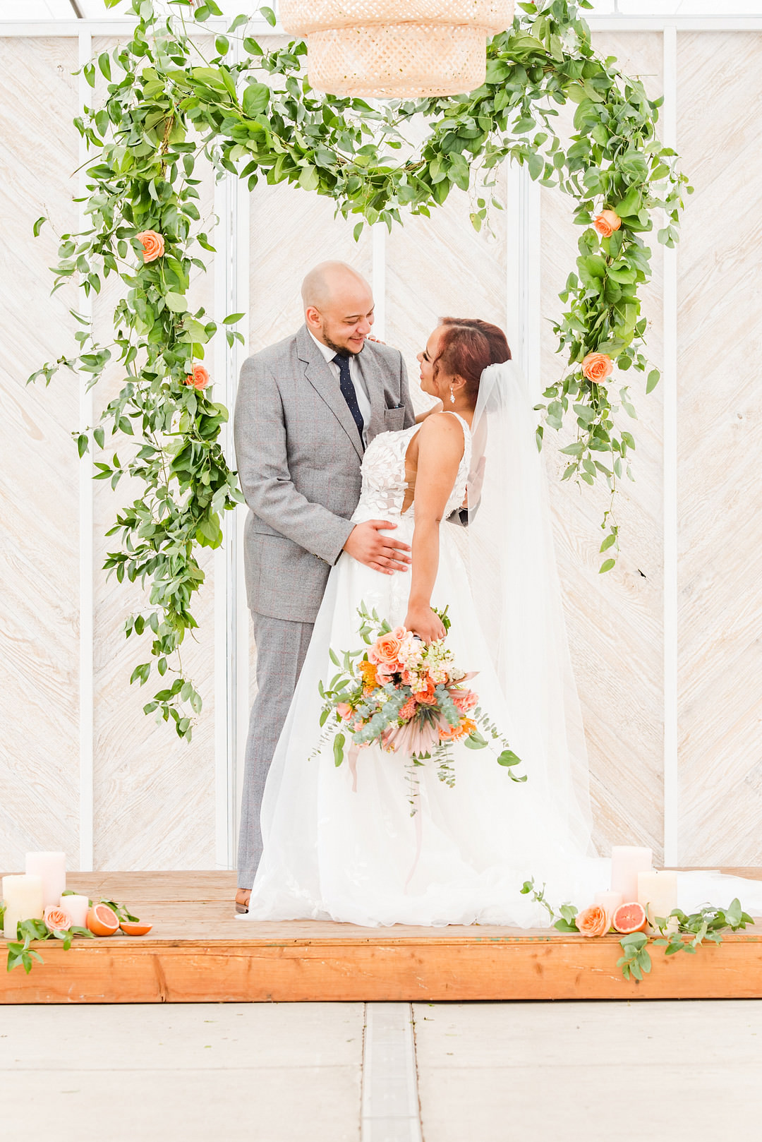 Citrus Wedding Ideas Pearls & Pines Photography Greenery Foliage Flower Arch Backdrop