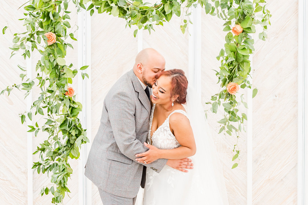 Citrus Wedding Ideas Pearls & Pines Photography Greenery Foliage Flower Arch Backdrop